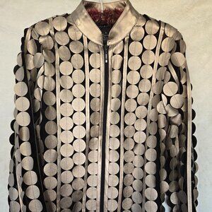 Small metallic gold faux leather jacket with circular cut-outs